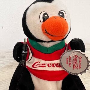 1999 Coca Cola Beanie Plush Penguin in hockey shirt